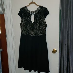 Black cocktail dress with lace detail
